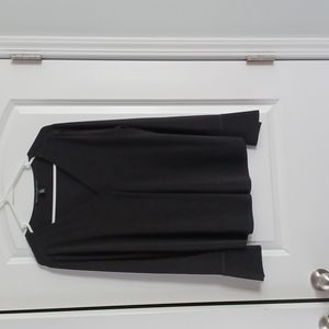 Long sleeve blouse with button on sleeve